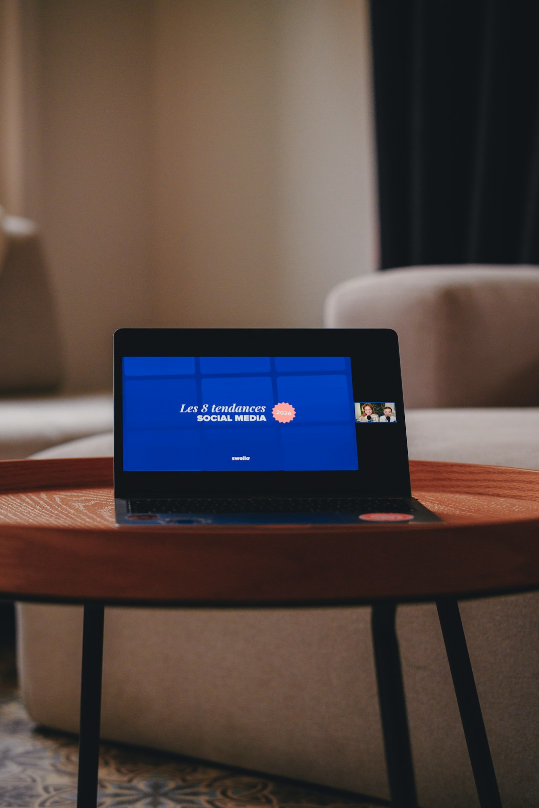 laptop-screen-displays-social-media-presentation-on-a-coffee-table-2a-fbfxzpl0