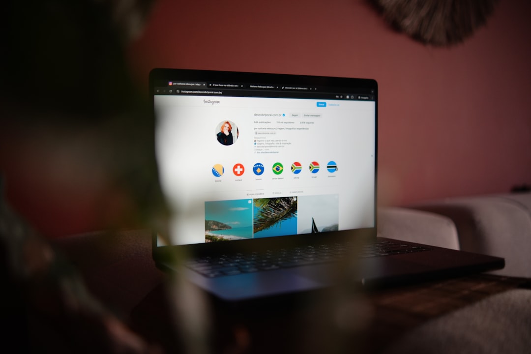 a-laptop-computer-sitting-on-top-of-a-wooden-table-s425tsyeurs
